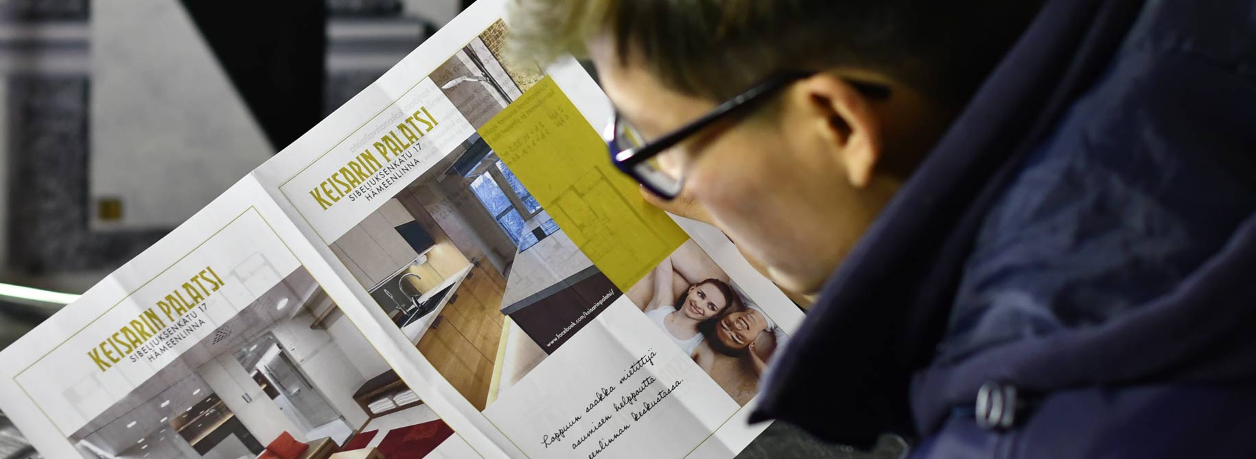 Picture of man viewing apartment advert