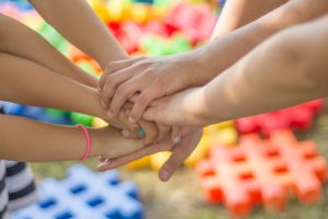 picture of children holding hands together
