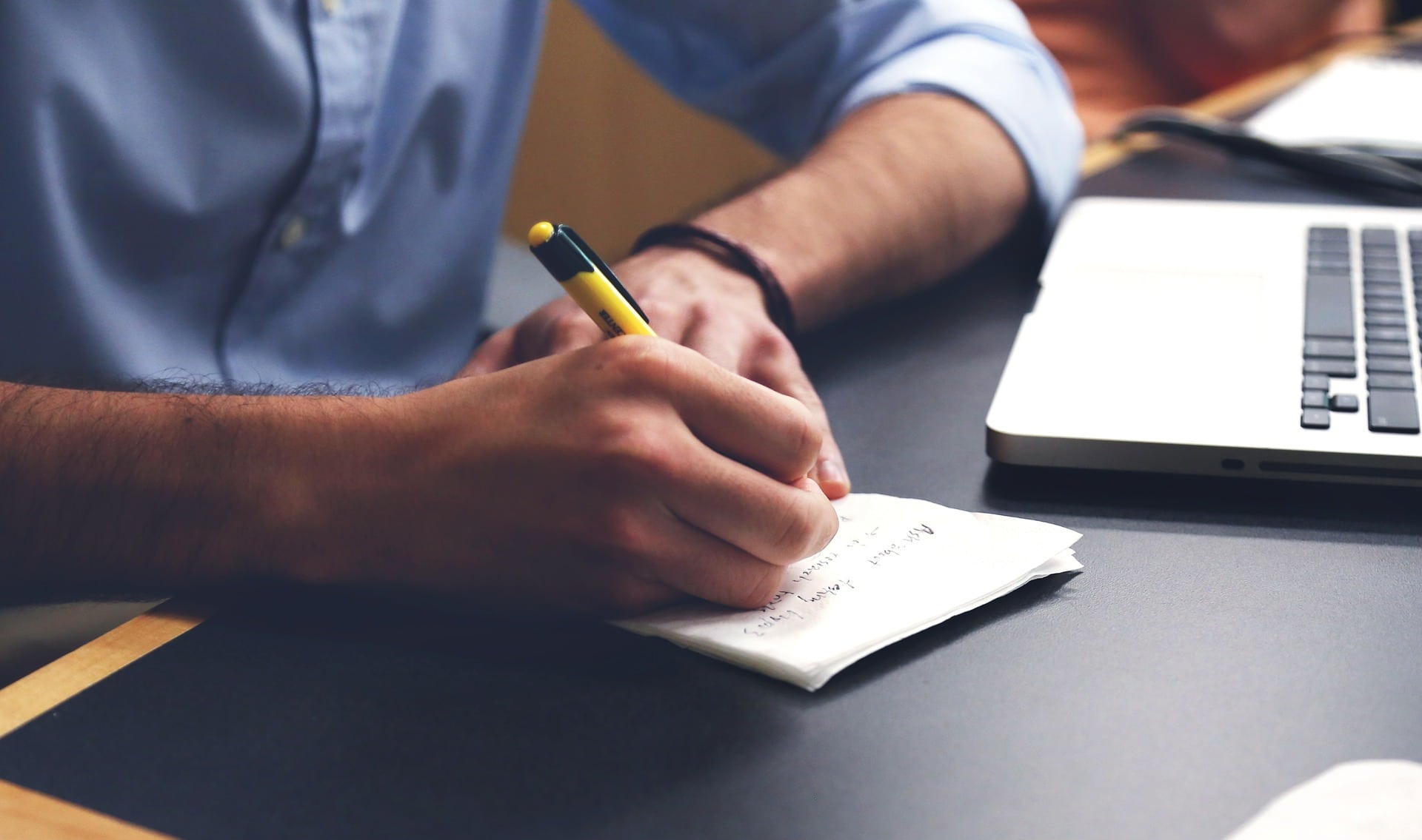 A man writing a plan