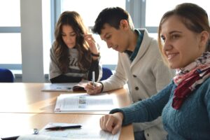 students sitting at a table