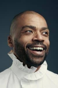 A close-up of a man who is smiling.